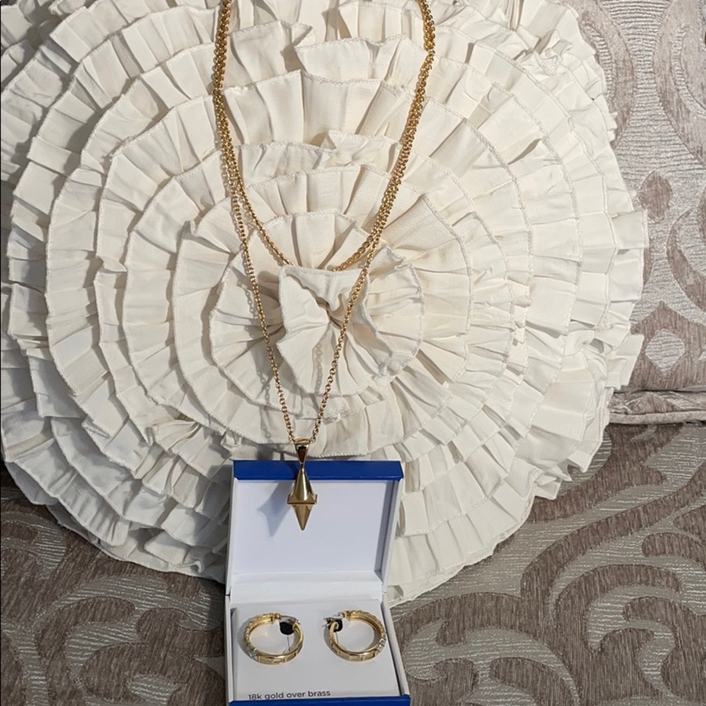 Gold pendant necklace and loop earrings.